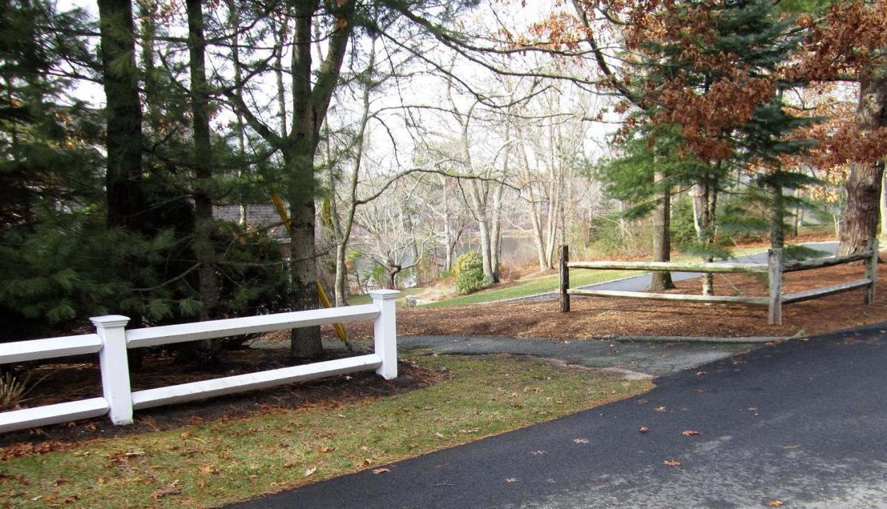 11 Cotuit Cove Road Cotuit, MA 02635 - Photo 31 of 35 a view of outdoor space with trees