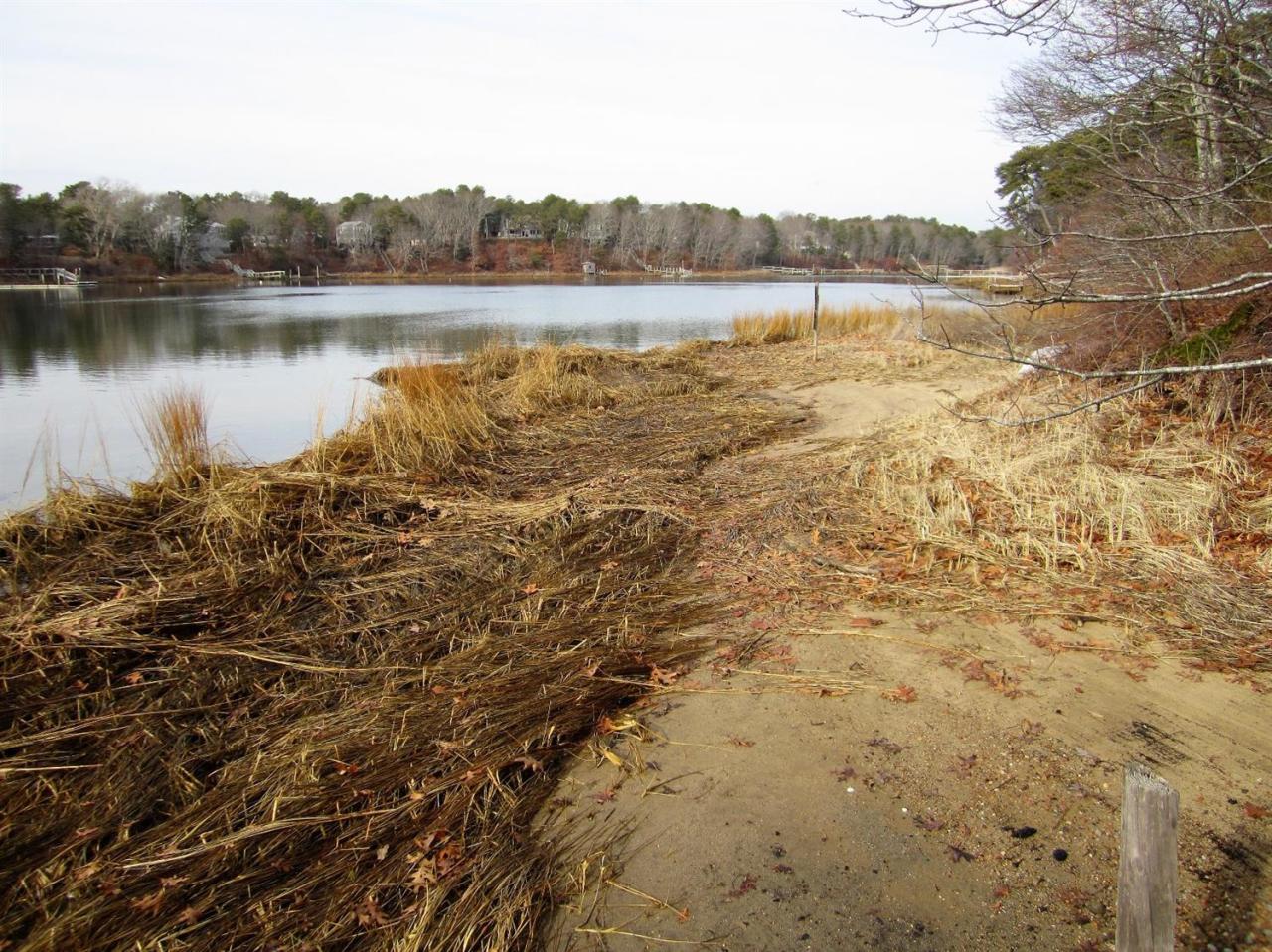 11 Cotuit Cove Road Cotuit, MA 02635 - Photo 32 of 35 a view of a lake with a mountain