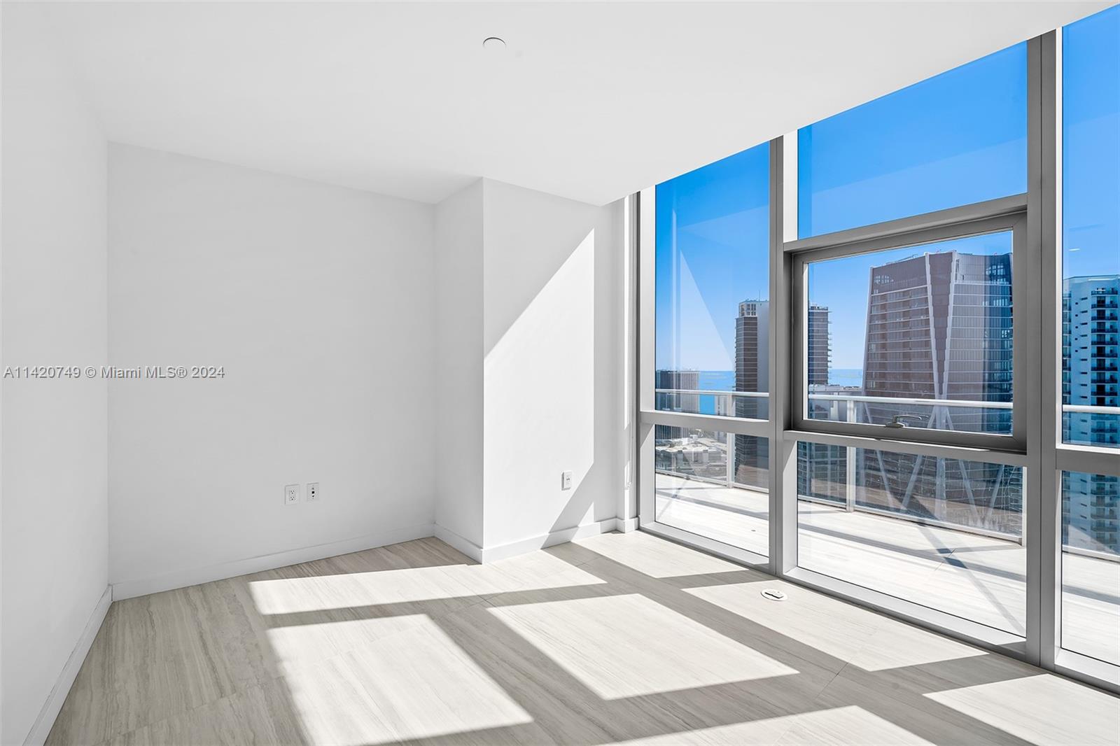 Park West Miami, FL 33132 - Photo 31 of 88 a view of a bedroom with wooden floor and entryway