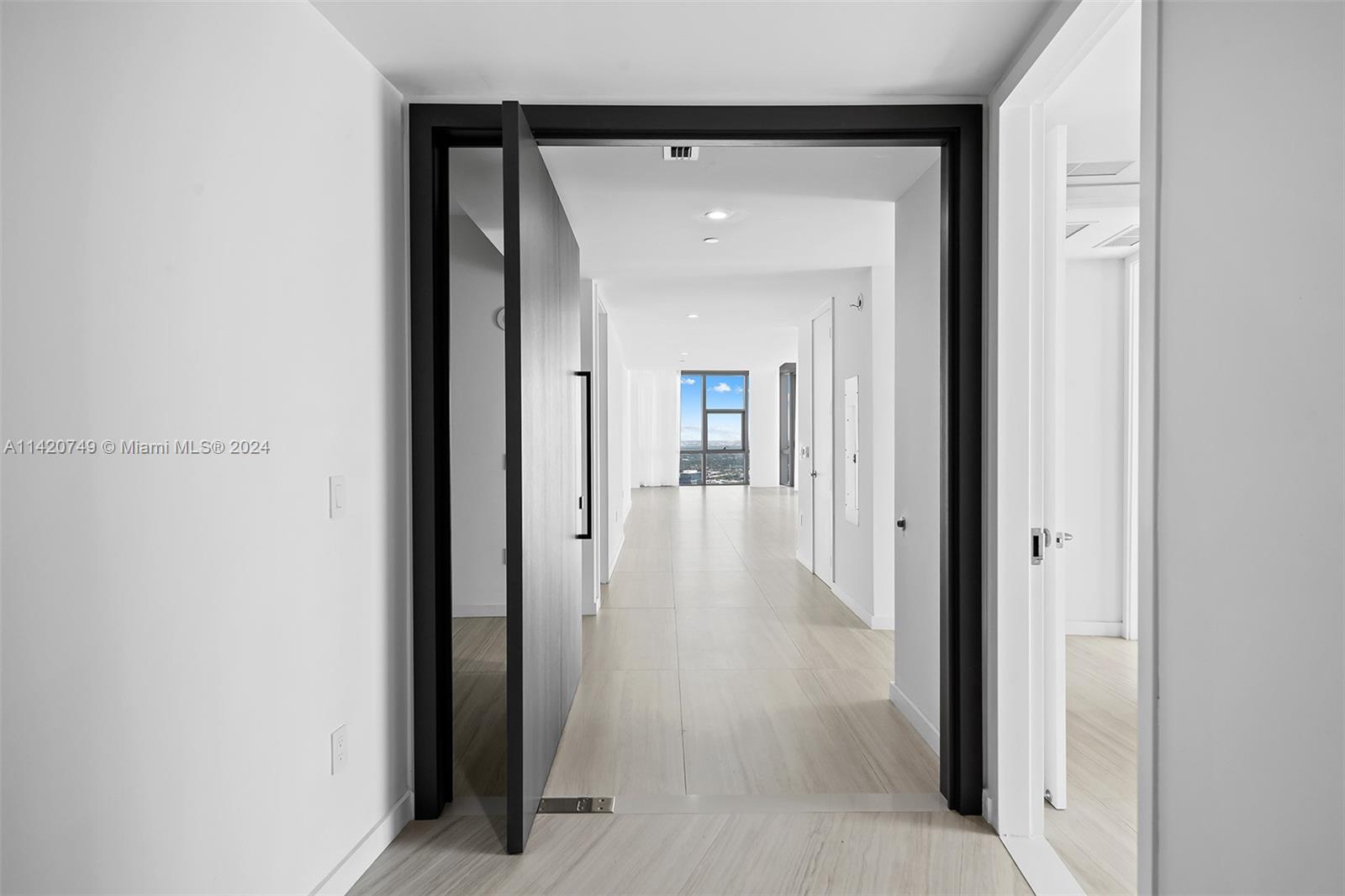 Park West Miami, FL 33132 - Photo 39 of 88 a view of a hallway with wooden floor