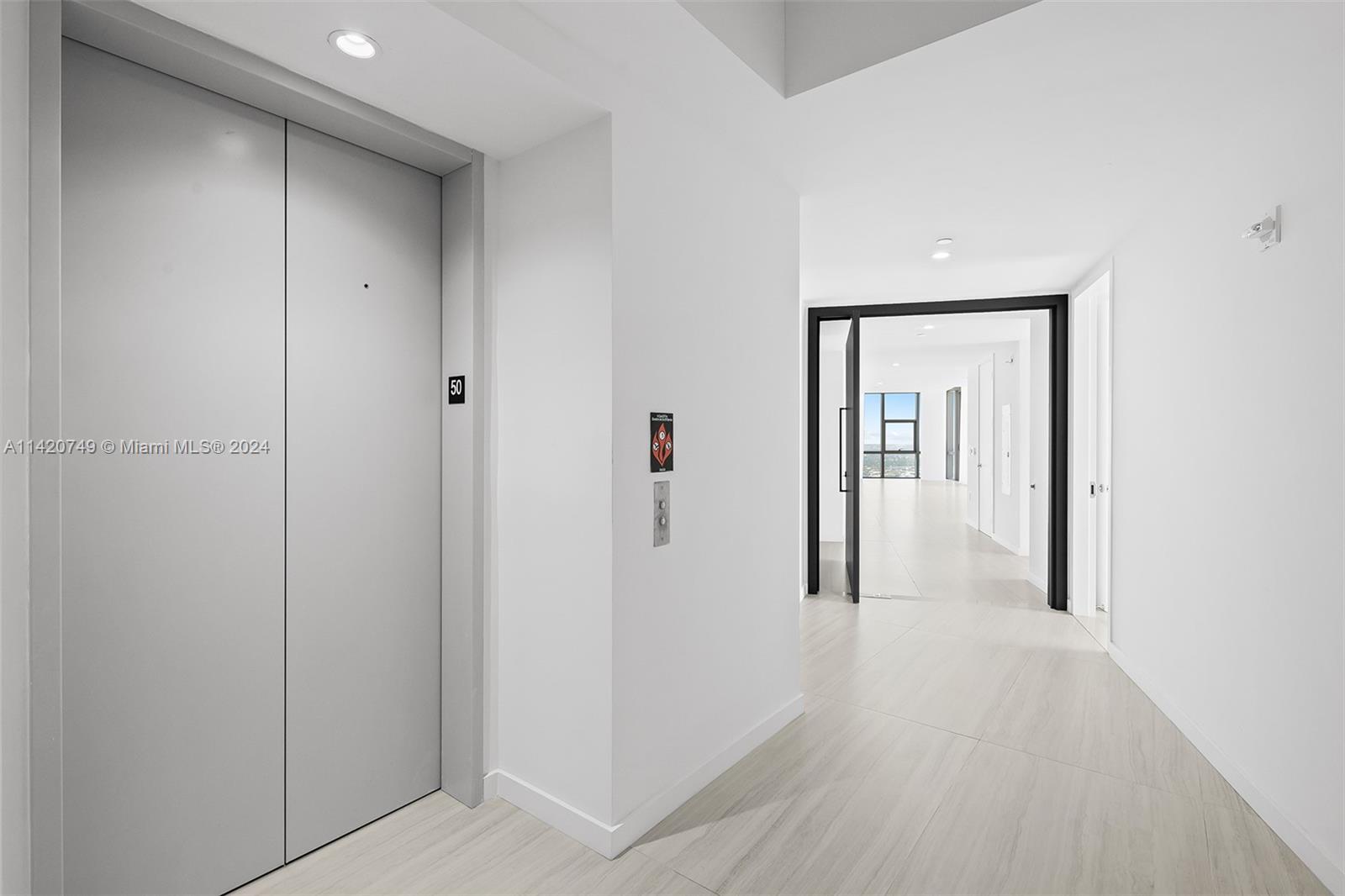 Park West Miami, FL 33132 - Photo 40 of 88 a view of a hallway with wooden floor