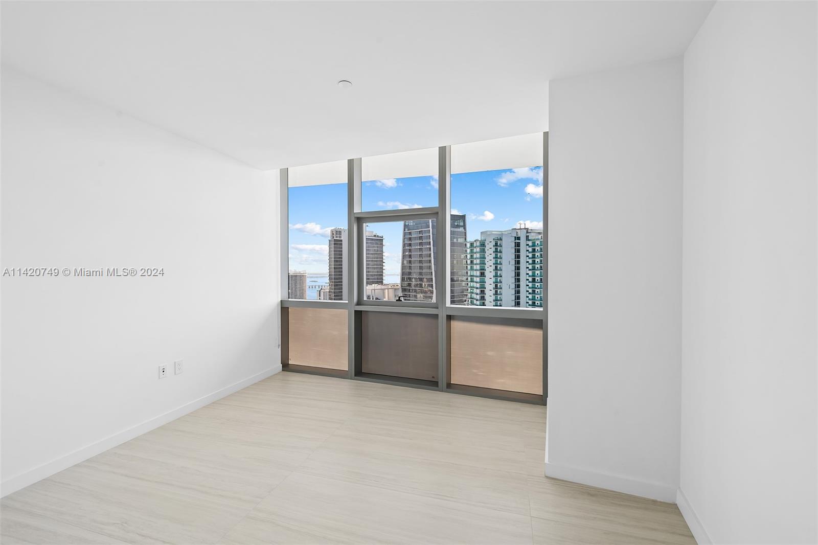 Park West Miami, FL 33132 - Photo 43 of 88 a view of an empty room with a window