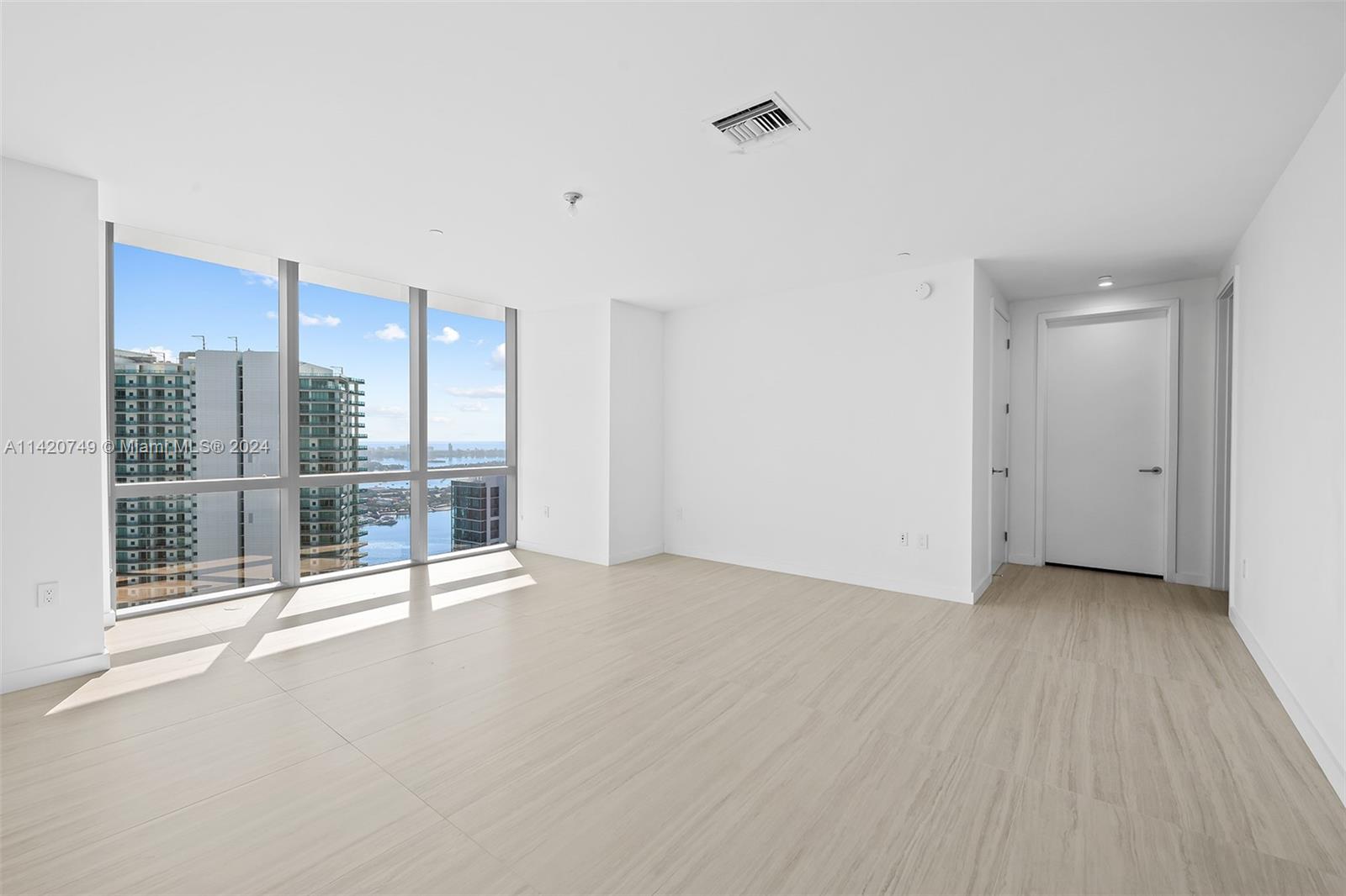 Park West Miami, FL 33132 - Photo 53 of 88 a view of an empty room with a sliding door