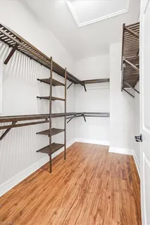 a view of entryway with wooden floor