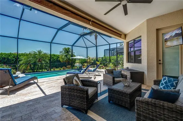 a outdoor living space with furniture and a potted plant