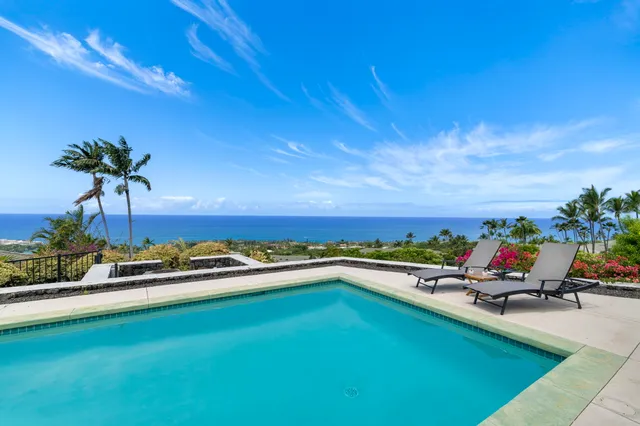 a view of a patio with swimming pool
