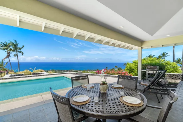 a outdoor dining space with furniture and outdoor view