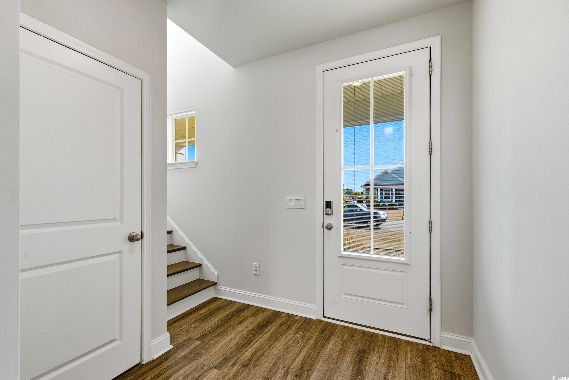 3083 Gillham Loop Myrtle Beach, SC 29588 - Photo 15 of 34 Full bathroom with double vanity, wood tiled floors, and a shower stall