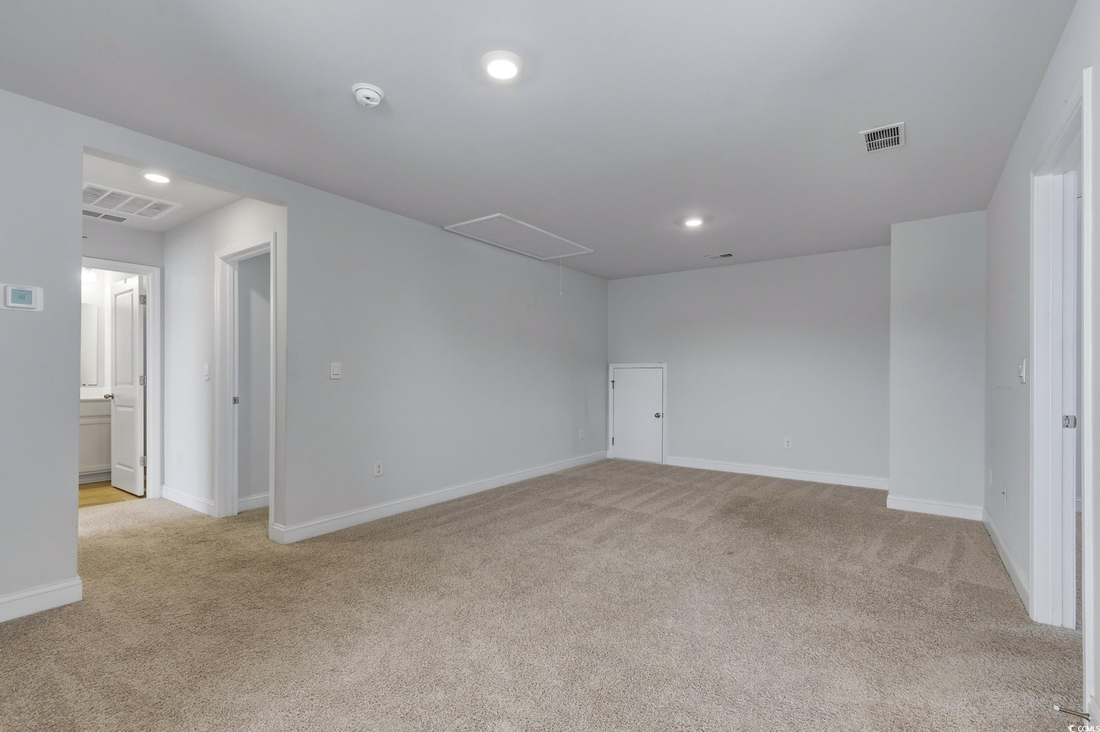 3083 Gillham Loop Myrtle Beach, SC 29588 - Photo 17 of 34 Doorway featuring stairway, plenty of natural light, and wood finished floors