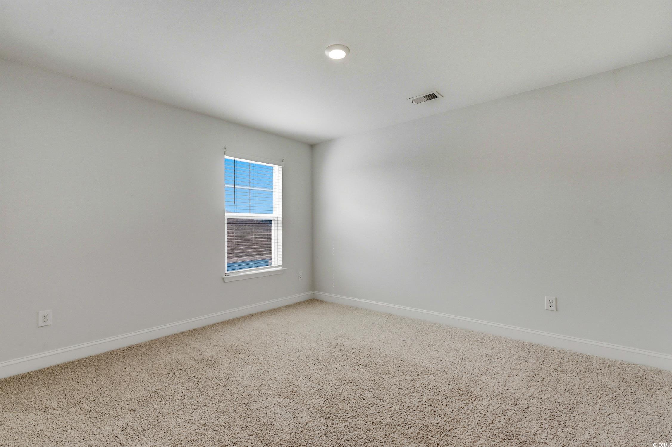 3083 Gillham Loop Myrtle Beach, SC 29588 - Photo 21 of 34 Empty room featuring recessed lighting and light carpet