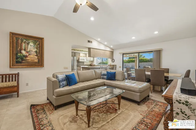 a living room with furniture and a table