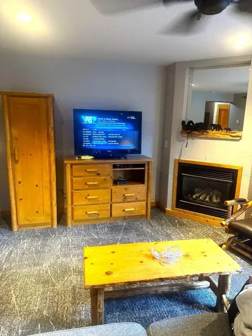 a bedroom with a bed and lamp