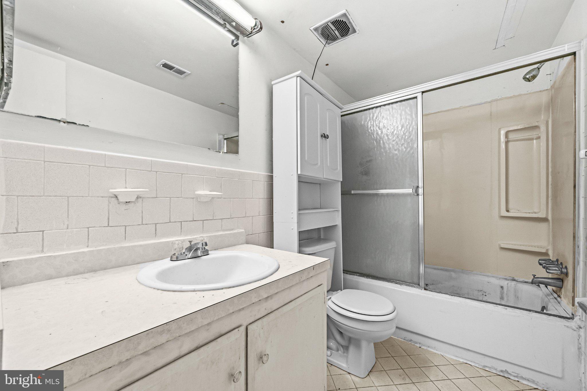 2103 Walsh View Terrace, Unit 102 Silver Spring, MD 20902 - Photo 17 of 30 Bright and functional bathroom space.