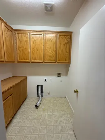 a view of a tree next to a yard