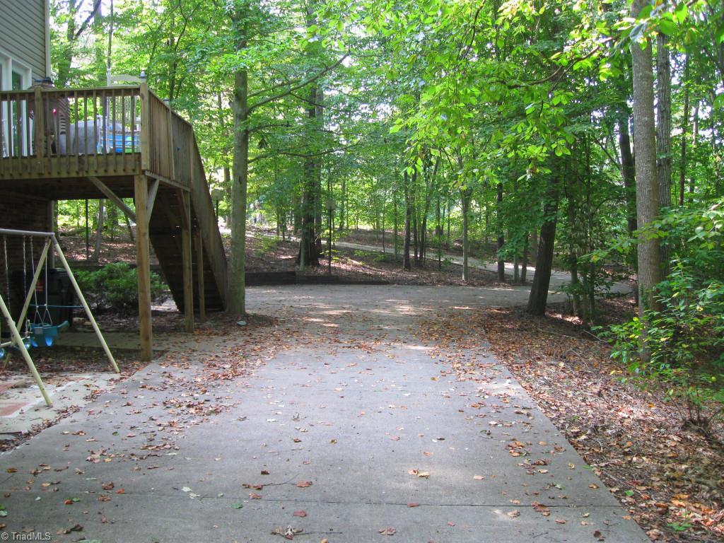 8301 Mccrory Road Stokesdale, NC 27357 - Photo 5 of 30 Concrete Driveway