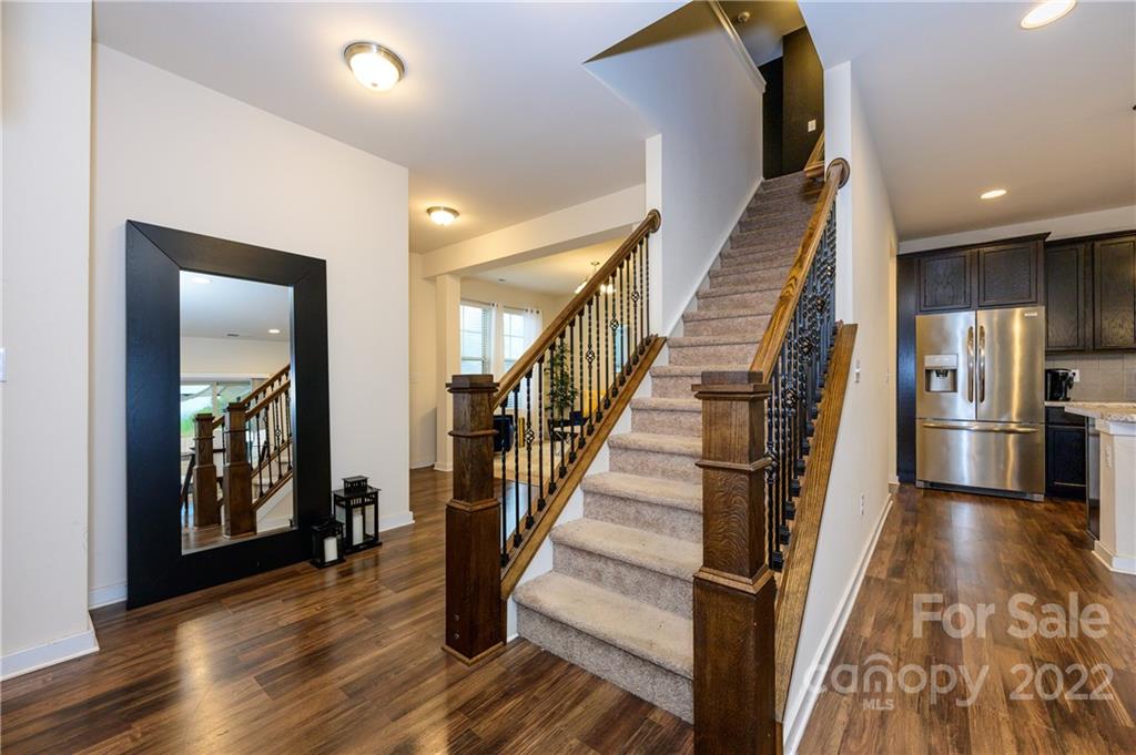4626 Gibbons Link Road Charlotte, NC 28269 - Photo 12 of 20 a view of entryway and hall with wooden floor
