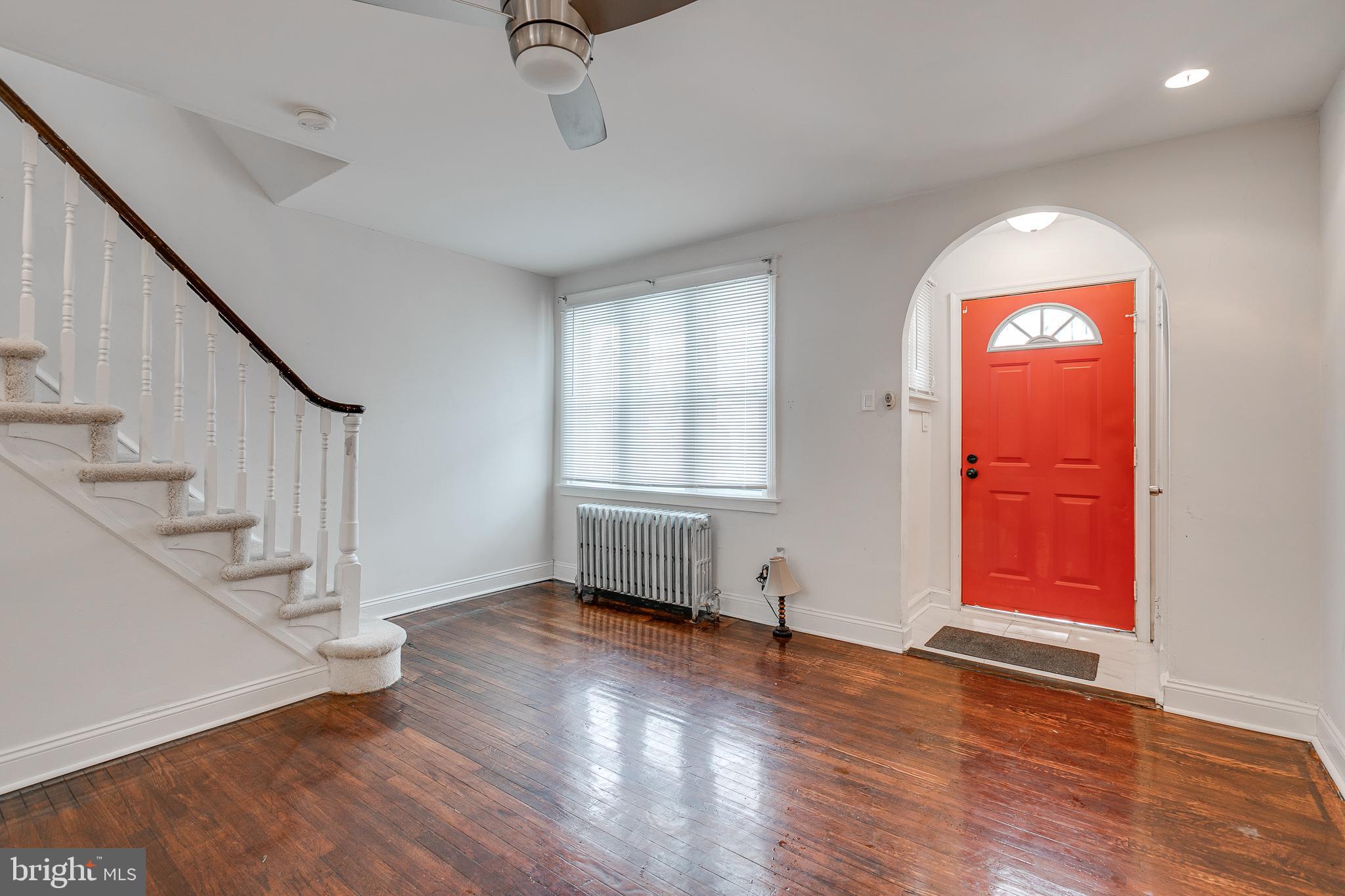 7811 Temple Road Philadelphia, PA 19150 - Photo 4 of 35 Spacious living room with new tile entry way