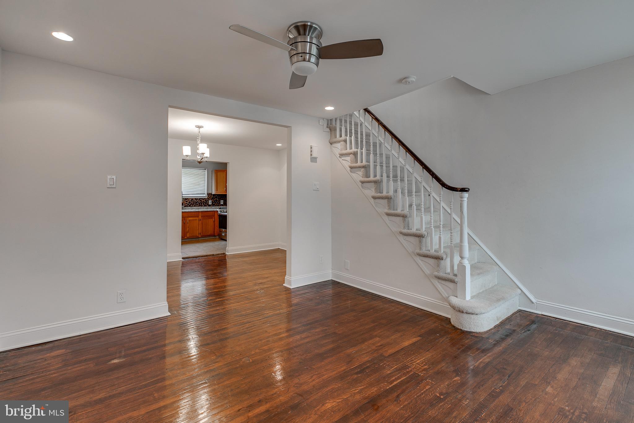 7811 Temple Road Philadelphia, PA 19150 - Photo 5 of 35 Modern dark wood floors and lighting fixtures