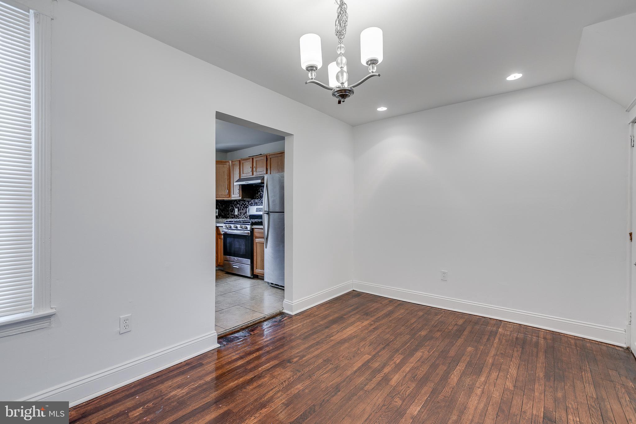 7811 Temple Road Philadelphia, PA 19150 - Photo 8 of 35 Dining room connects the kitchen and living room