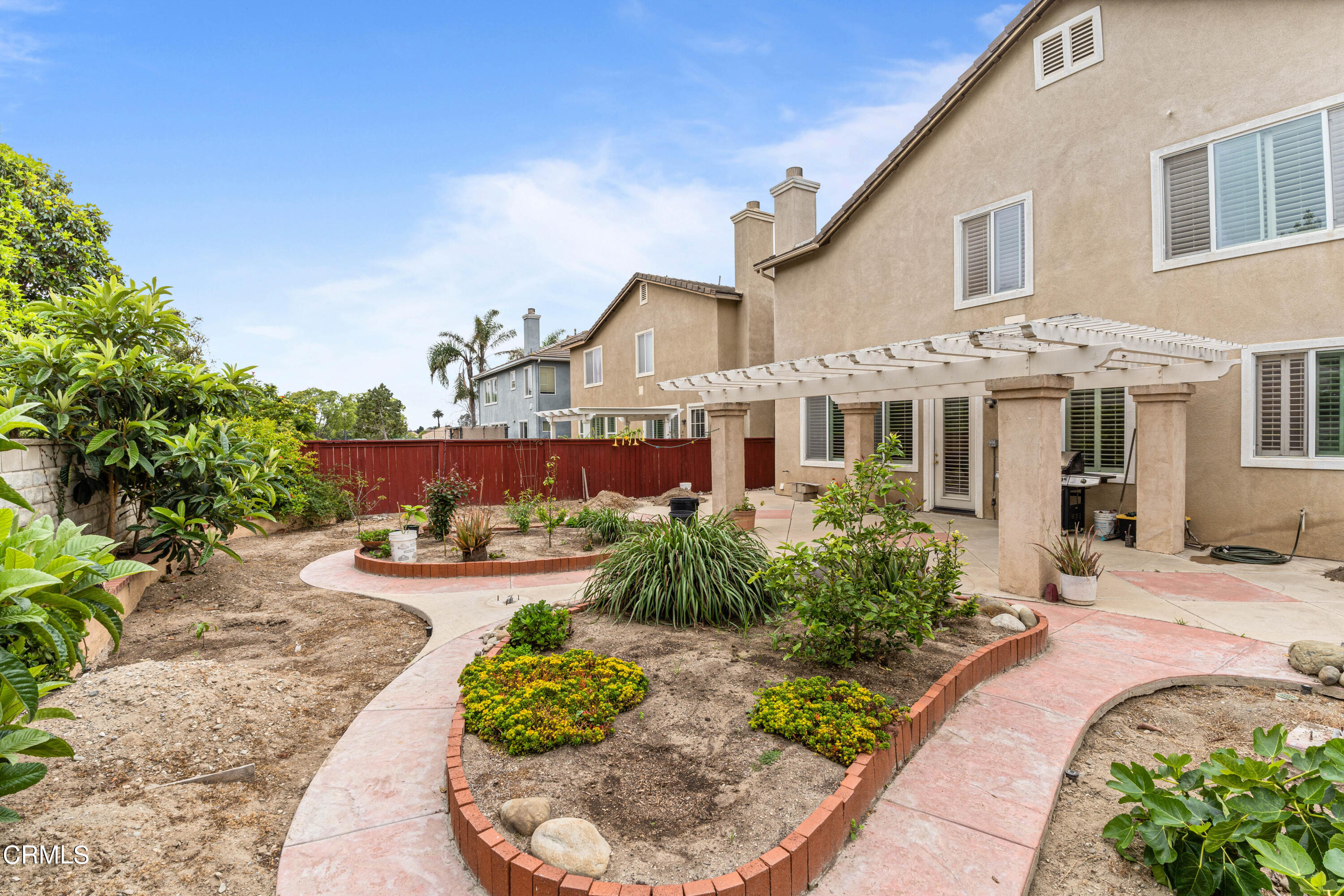 1620 Rubio Circle Oxnard, CA 93030 - Photo 12 of 68 a front view of a house with a yard