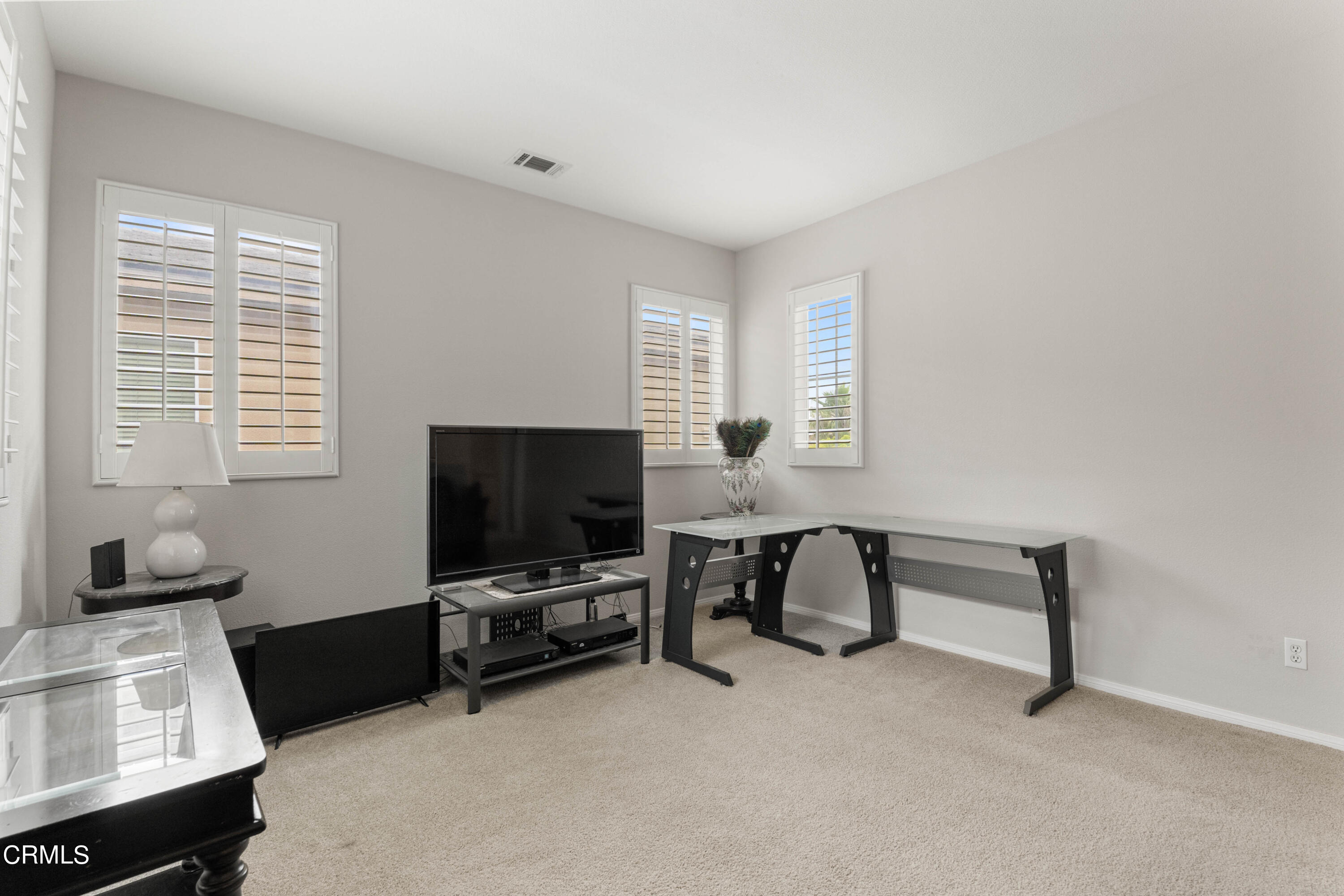 1620 Rubio Circle Oxnard, CA 93030 - Photo 20 of 68 a bedroom with furniture and a window