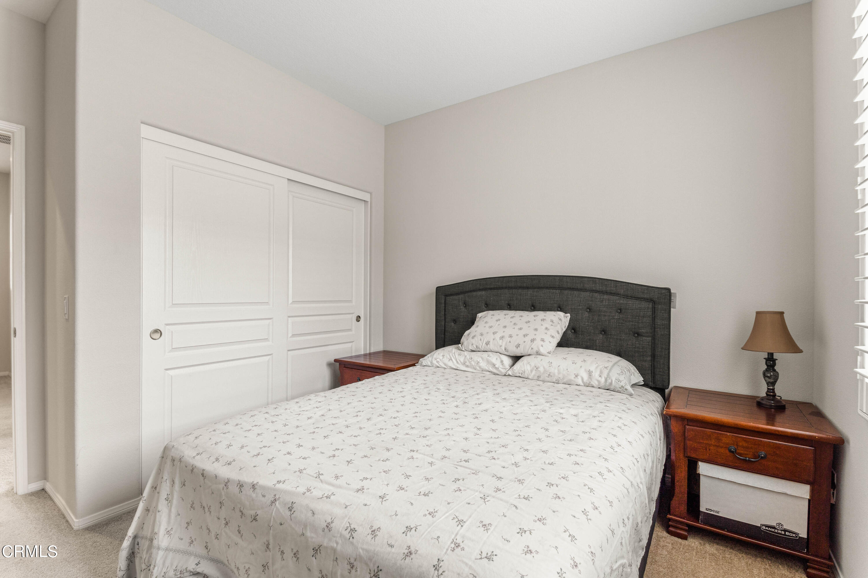 1620 Rubio Circle Oxnard, CA 93030 - Photo 23 of 68 a bedroom with a bed and a night stand
