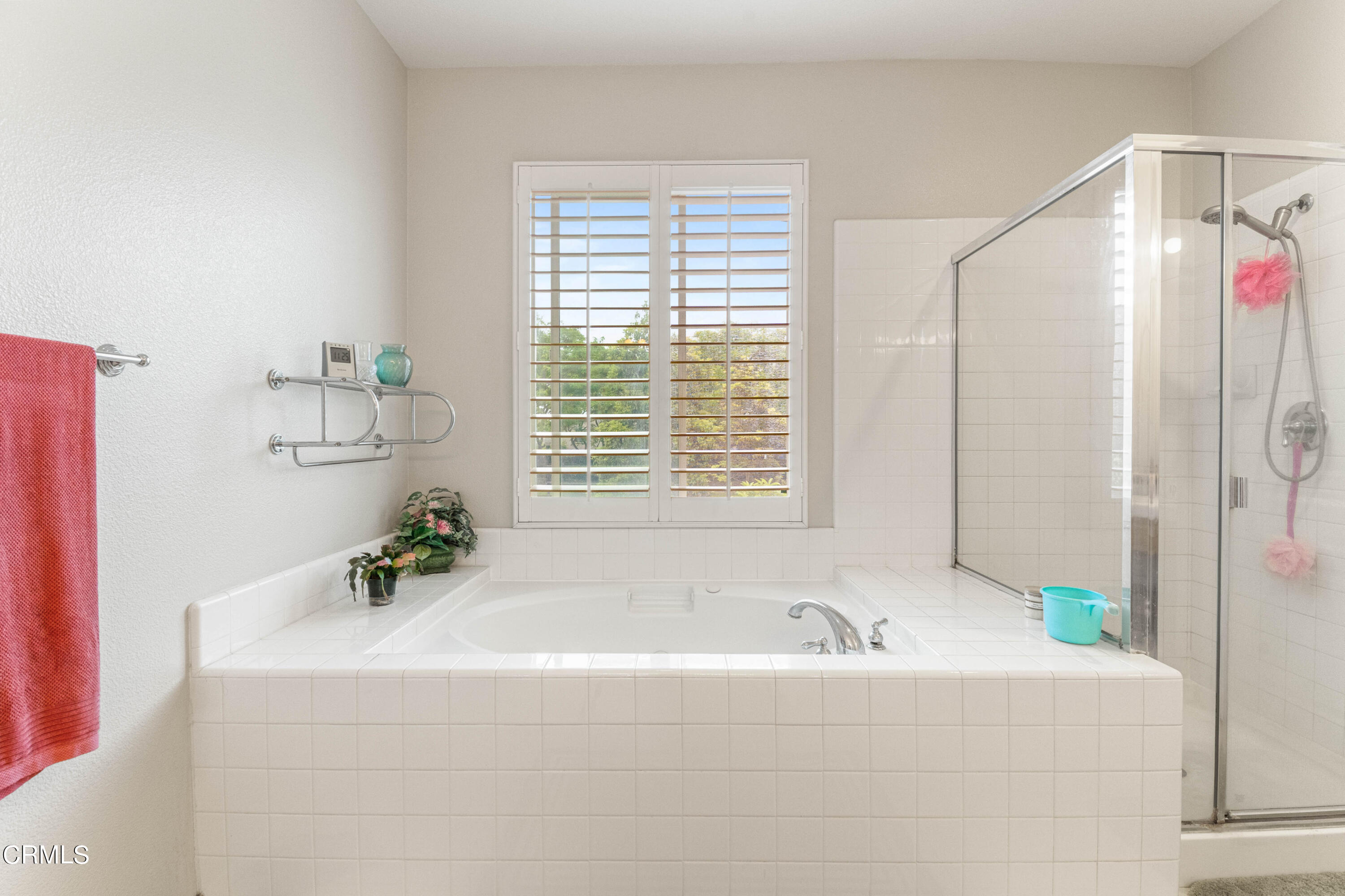 1620 Rubio Circle Oxnard, CA 93030 - Photo 29 of 68 a white bath tub sitting in a bathroom next to a window