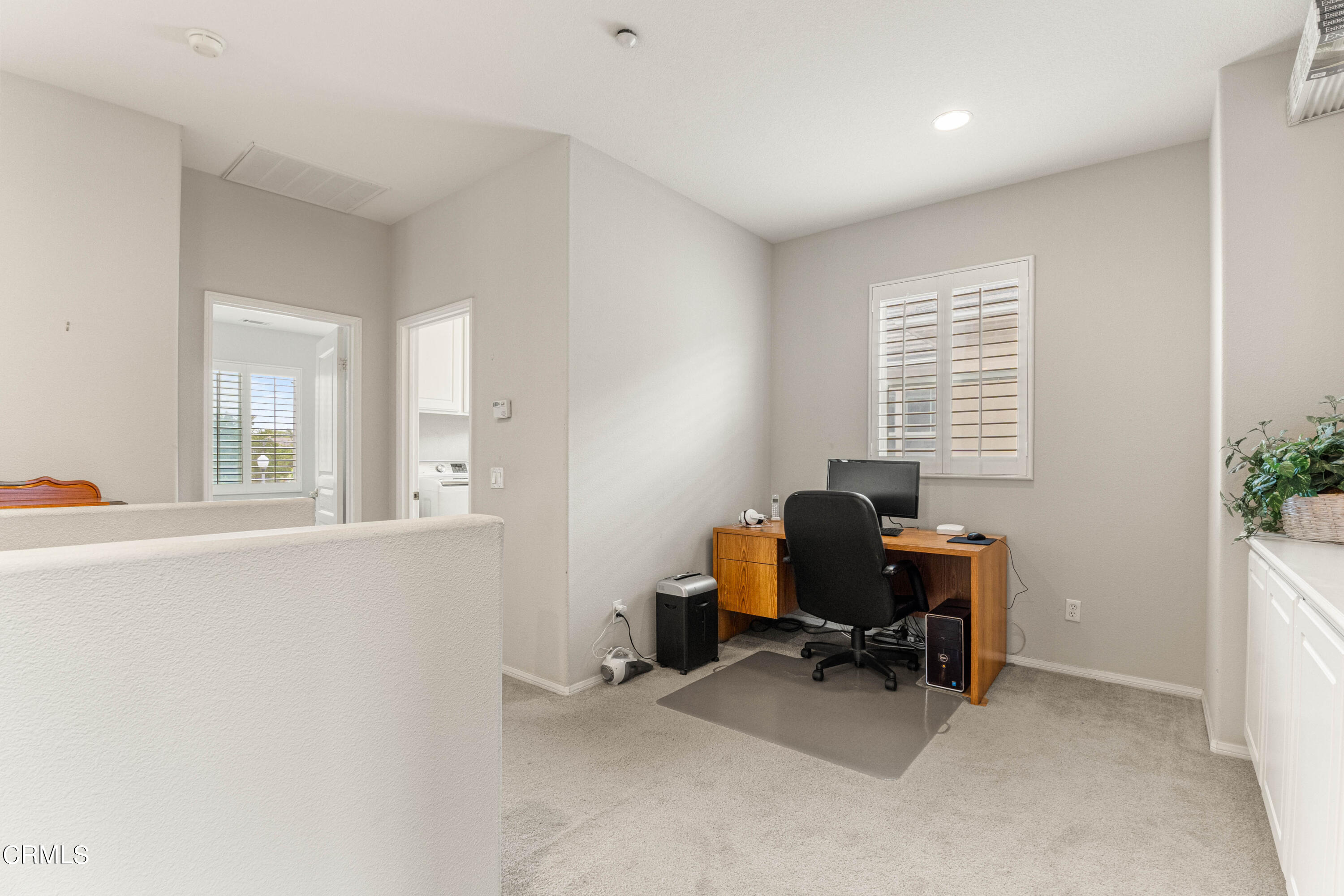1620 Rubio Circle Oxnard, CA 93030 - Photo 36 of 68 a view of a workspace with furniture and a window