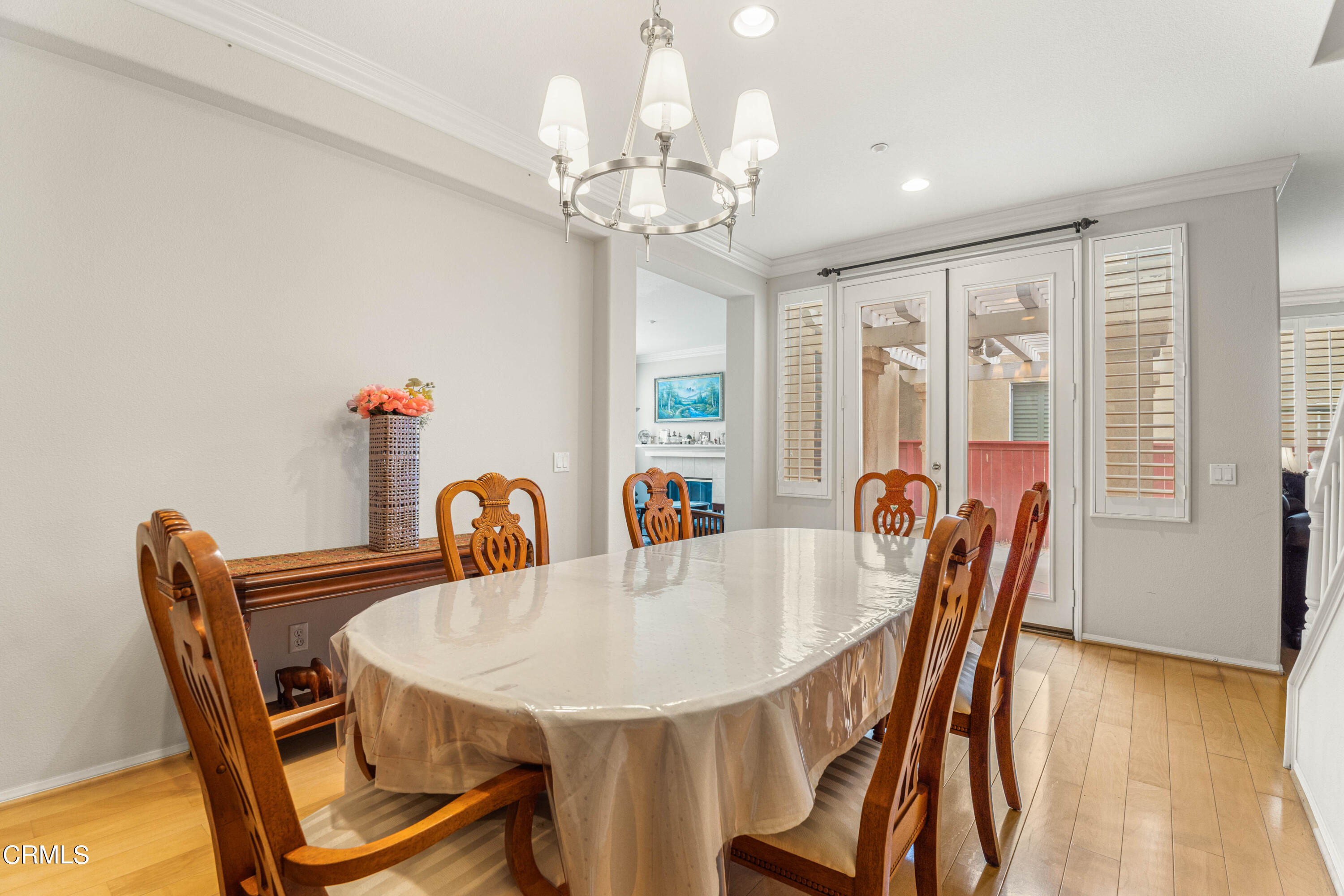 1620 Rubio Circle Oxnard, CA 93030 - Photo 50 of 68 a view of a dining room with furniture and wooden floor