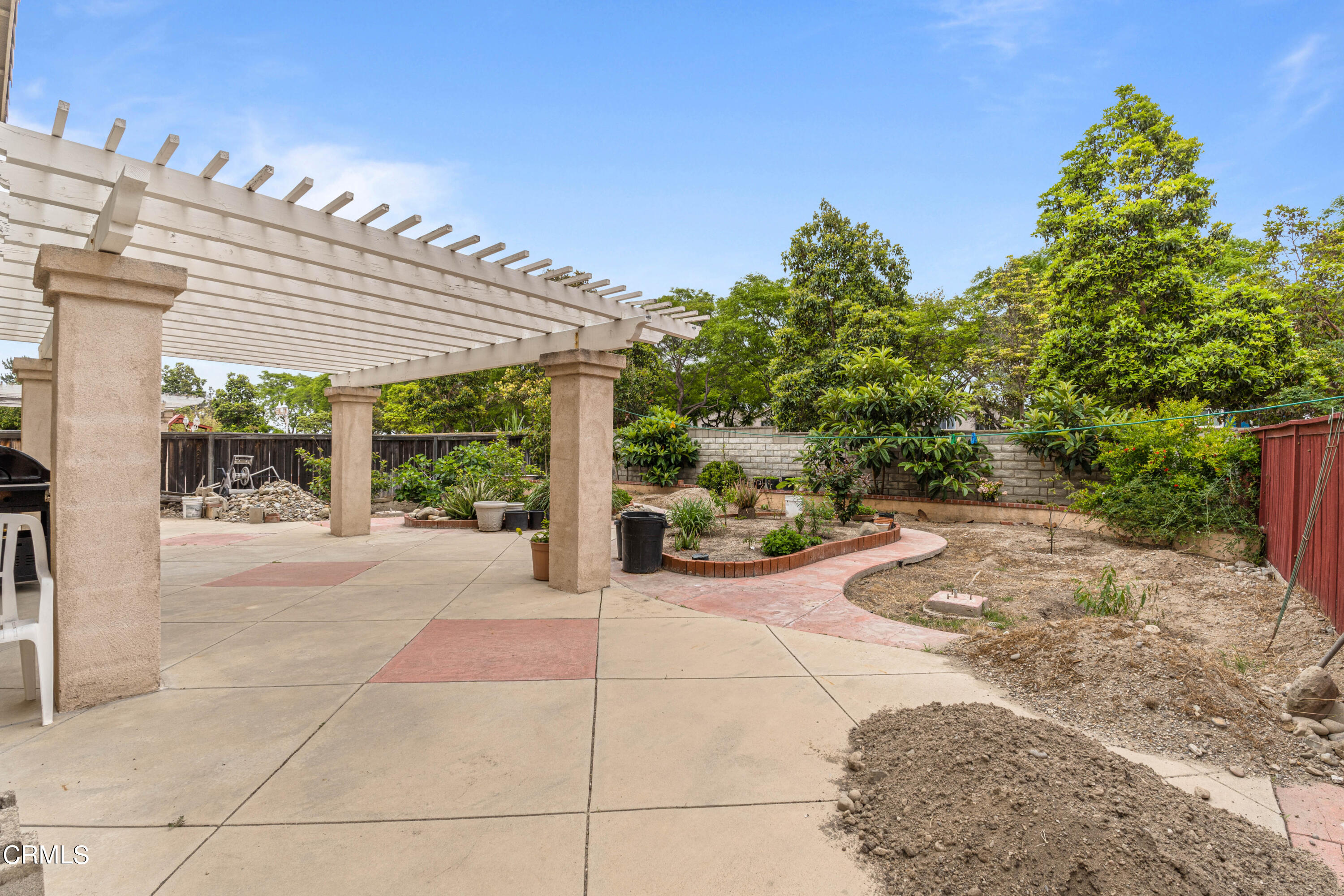 1620 Rubio Circle Oxnard, CA 93030 - Photo 66 of 68 a view of a patio with table and chairs and potted plants