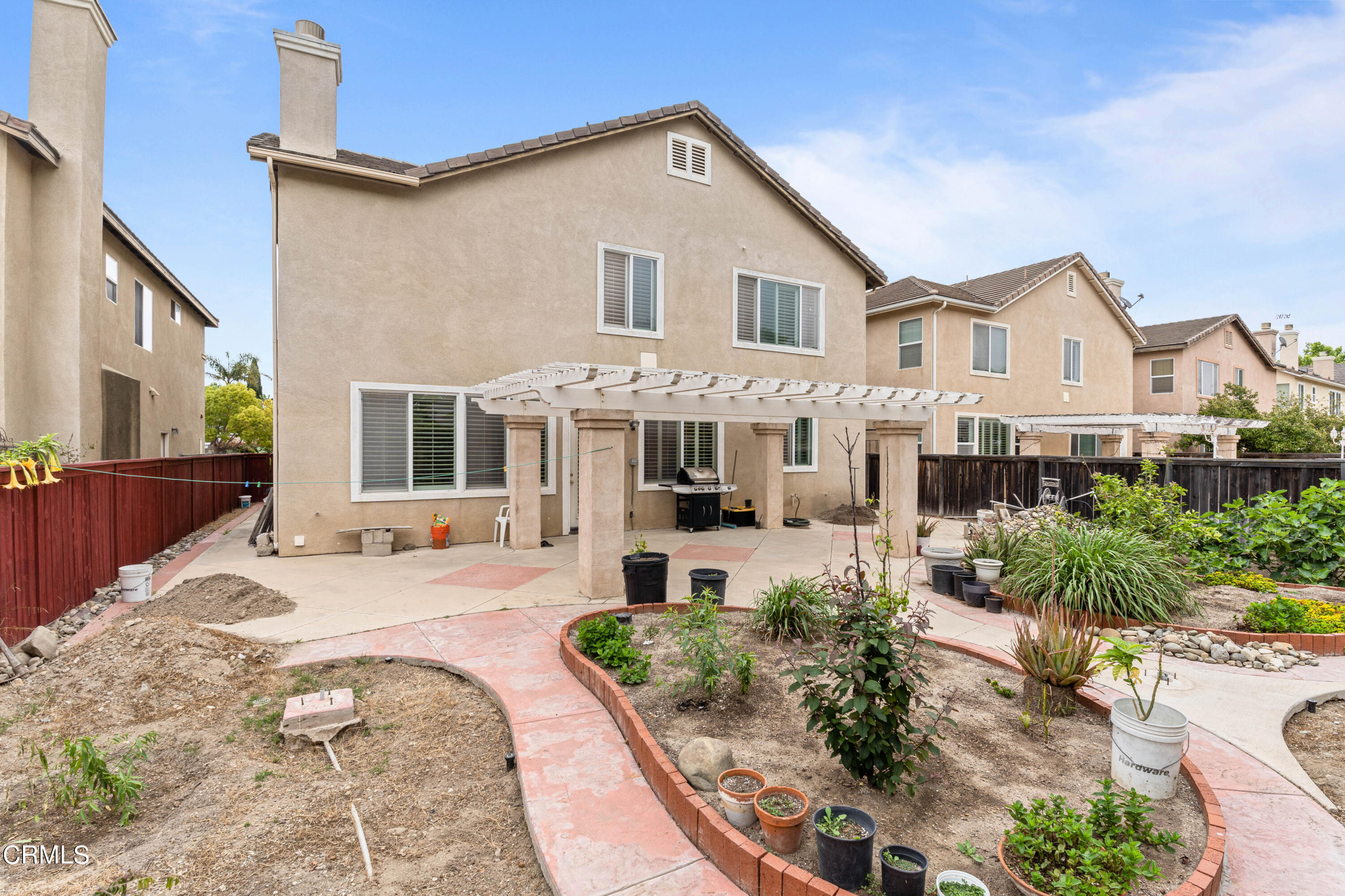 1620 Rubio Circle Oxnard, CA 93030 - Photo 10 of 68 a front view of a house with a yard