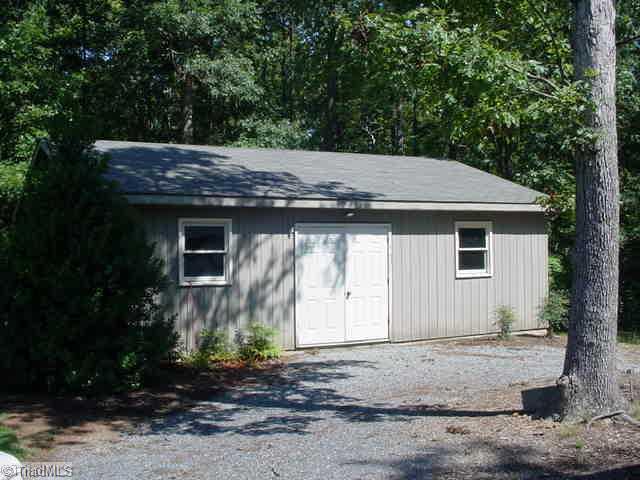 2192 Shiptontown Road Lexington, NC 27292 - Photo 4 of 12 Workshop. Super shop 24x30 size w/ concrete floor, double entry door & single garage door.
