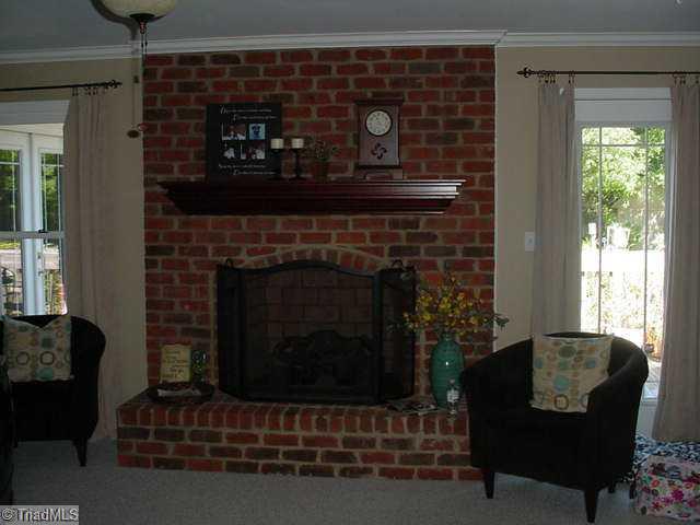 2192 Shiptontown Road Lexington, NC 27292 - Photo 8 of 12 Living Room. Gorgeous brick fireplace with arched opening compliments the cozy feel of this room, which opens on to deck overlooking large inground pool.