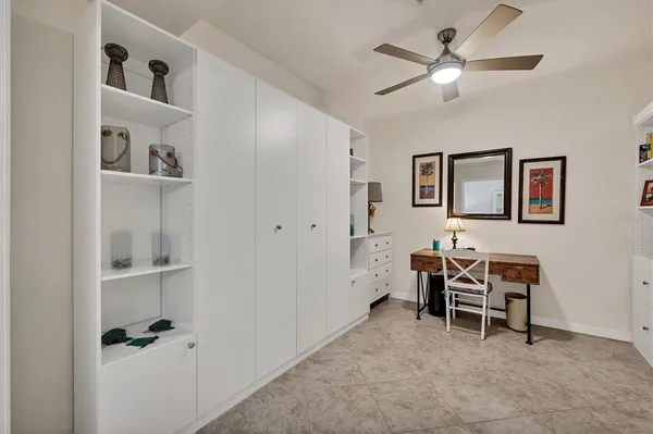 a view of a workspace with furniture