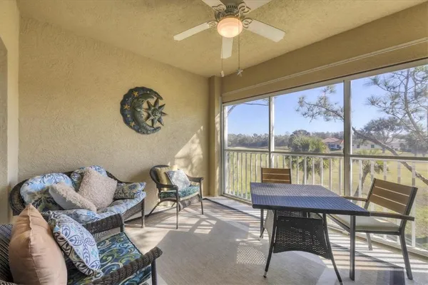 a view of a livingroom with furniture and window