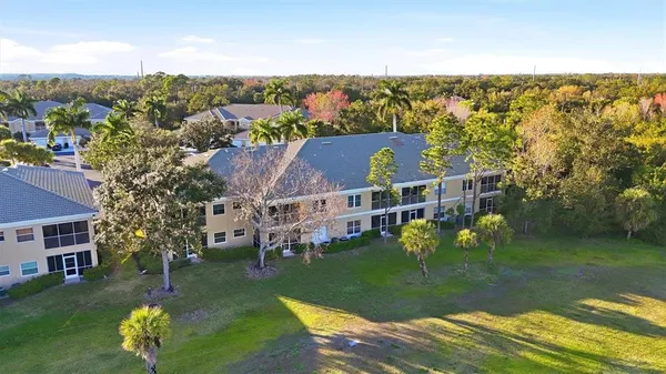 an aerial view of a house with a garden