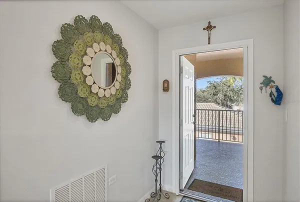 a view of a porch of a house