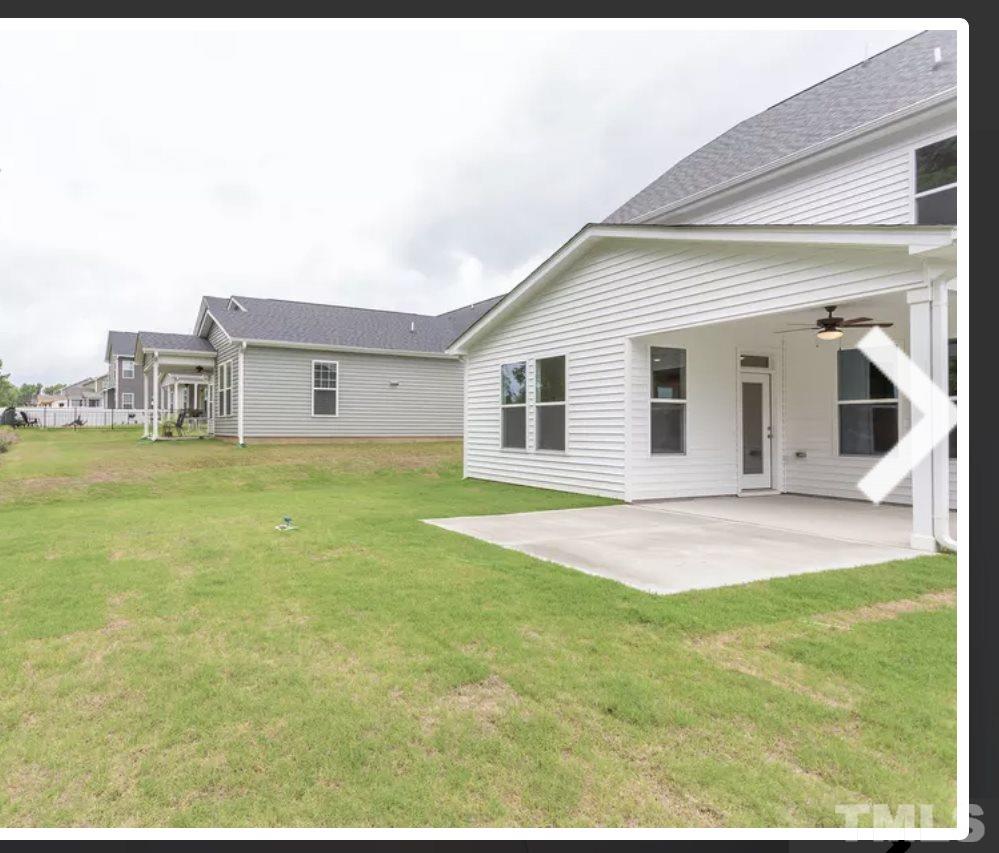 234 Hopper Circle Clayton, NC 27520 - Photo 2 of 22 a house view with swimming pool in front of it