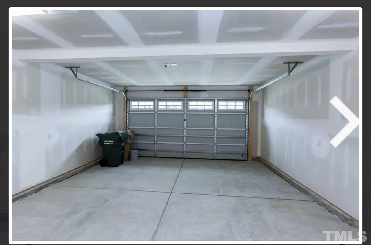234 Hopper Circle Clayton, NC 27520 - Photo 12 of 22 a view of a garage