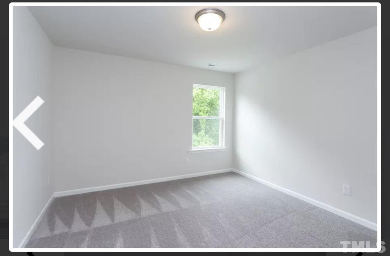 234 Hopper Circle Clayton, NC 27520 - Photo 17 of 22 a view of room with window