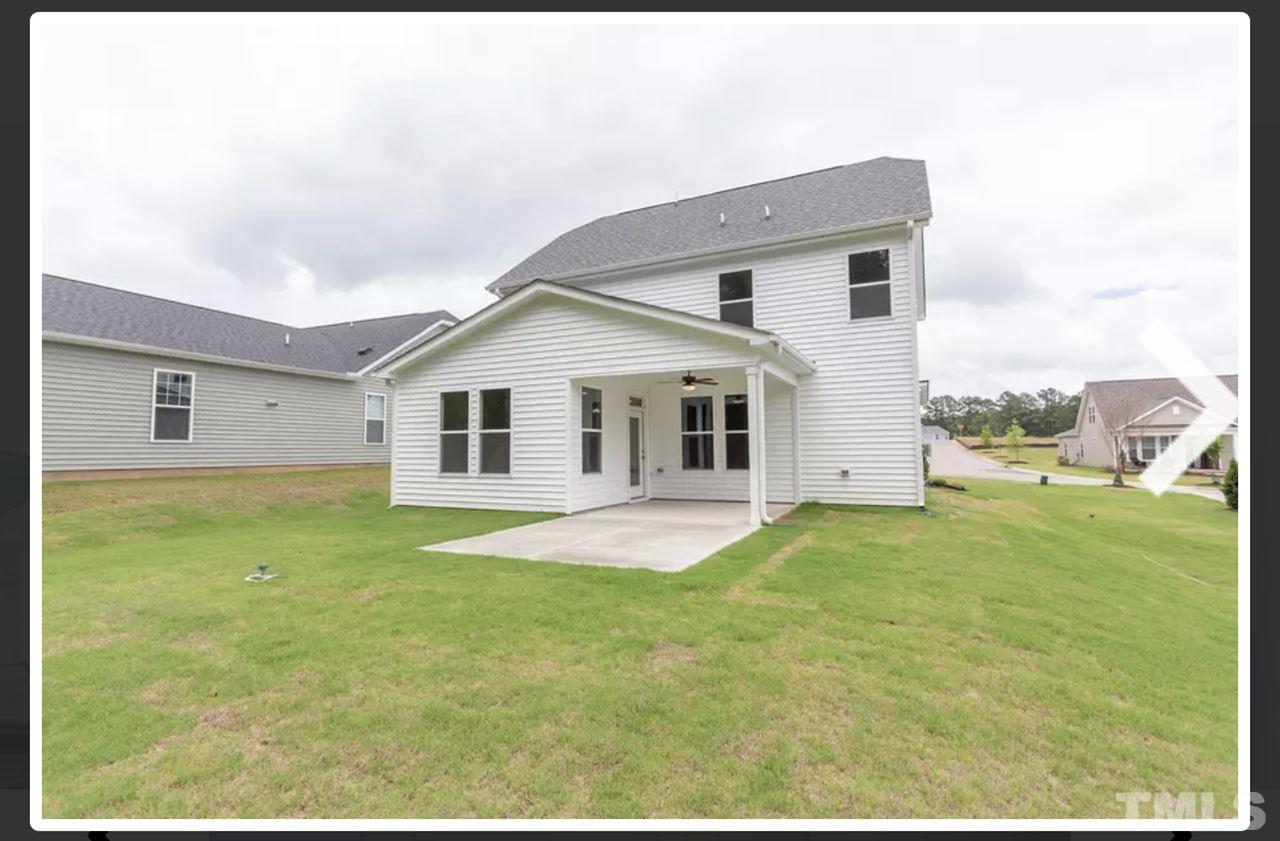 234 Hopper Circle Clayton, NC 27520 - Photo 3 of 22 a backyard of a house