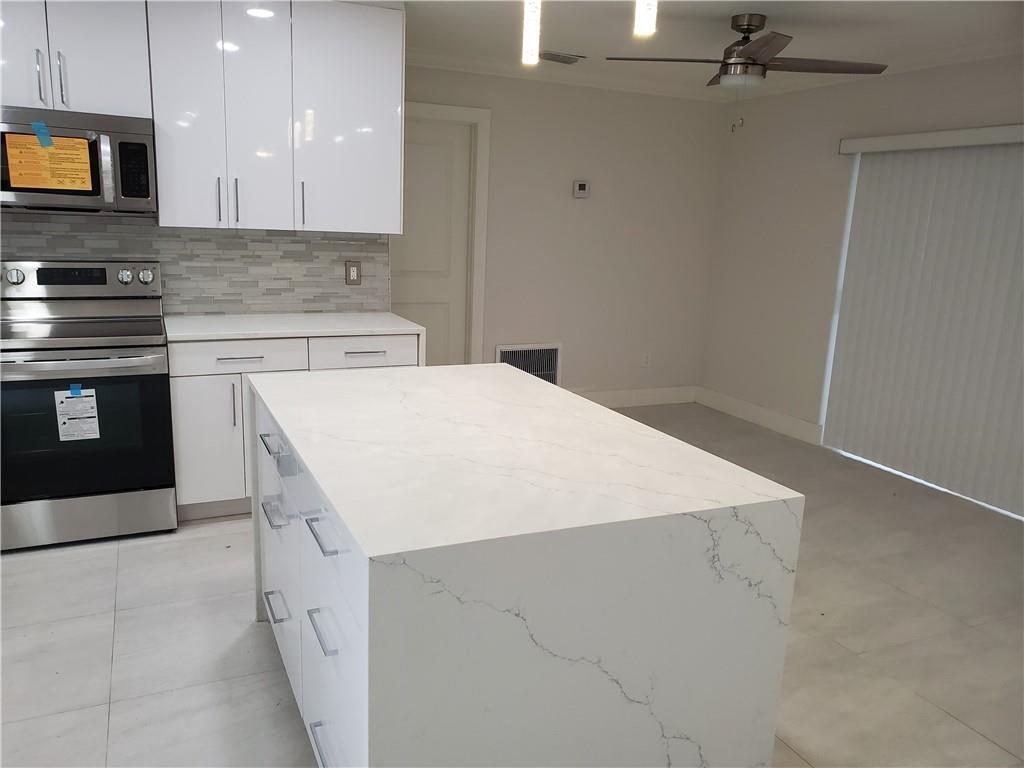 9632 Kenilworth Court Boca Raton, FL 33428 - Photo 2 of 12 GetMedia (1)