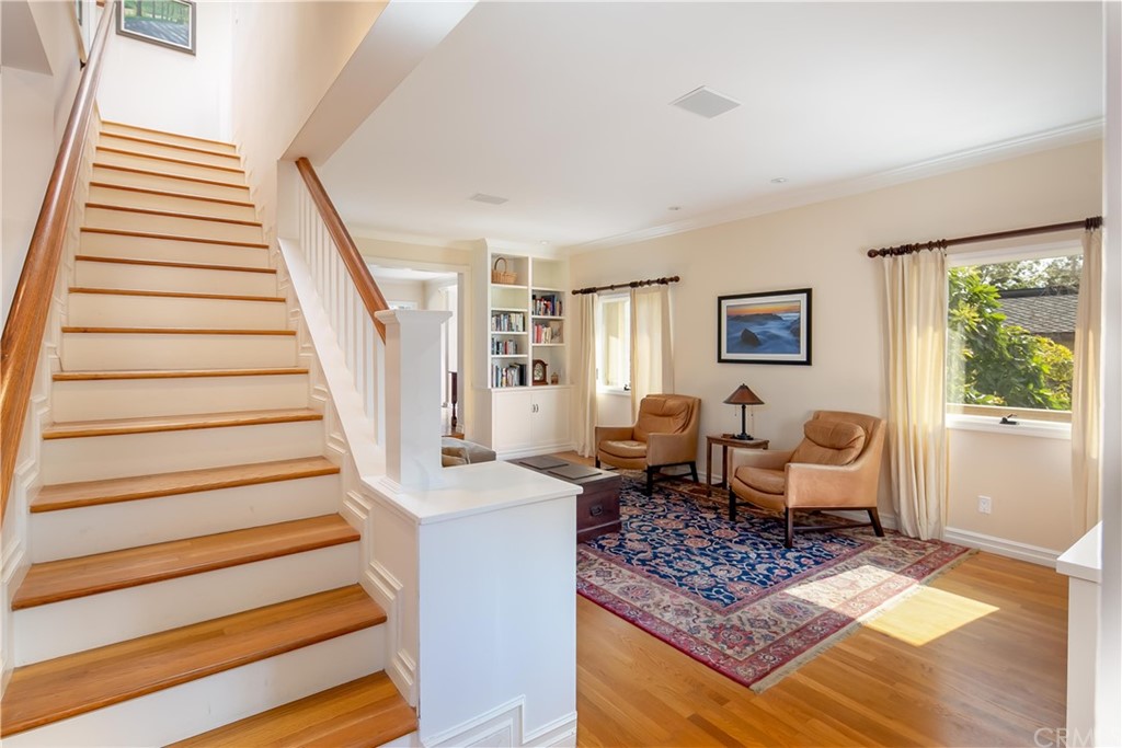 652 Agate Street Laguna Beach, CA 92651 - Photo 12 of 19 a bed room with furniture and a window