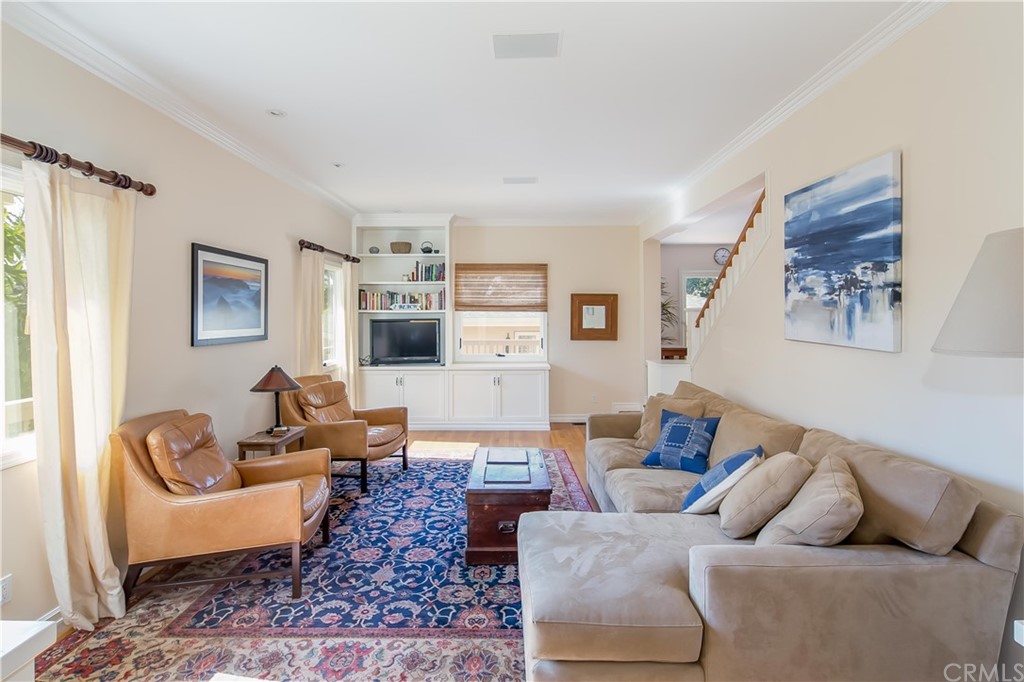 652 Agate Street Laguna Beach, CA 92651 - Photo 6 of 19 a living room with furniture and a couch