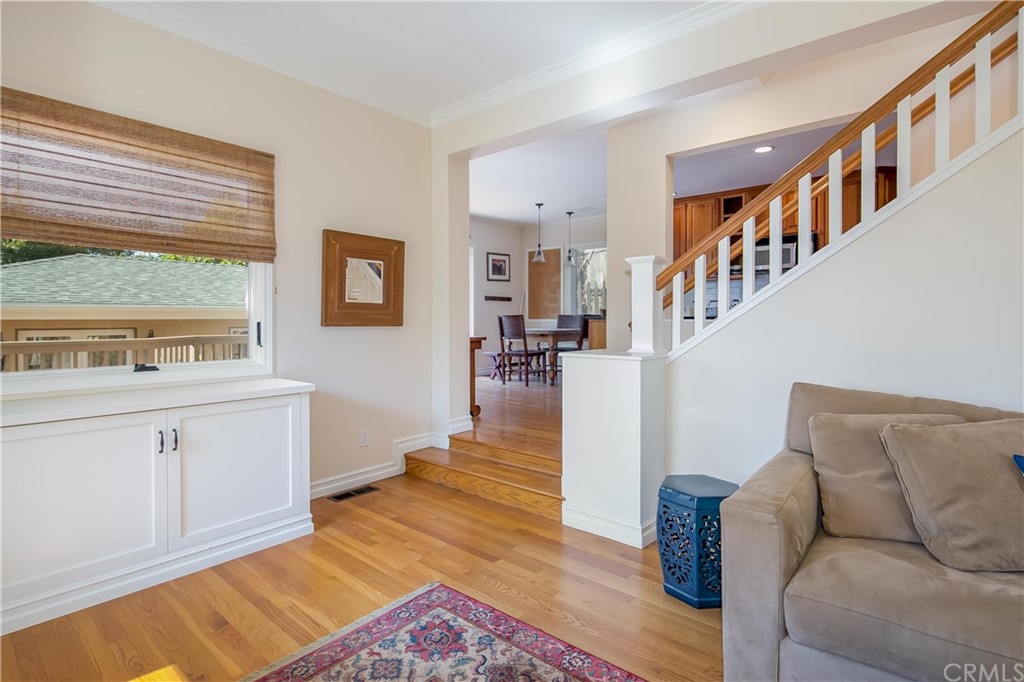 652 Agate Street Laguna Beach, CA 92651 - Photo 7 of 19 a living room with furniture and a wooden floor