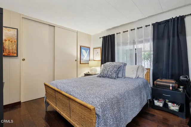 a bathroom with a sink toilet and mirror
