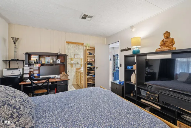 a kitchen with stainless steel appliances granite countertop a sink dishwasher stove and cabinets