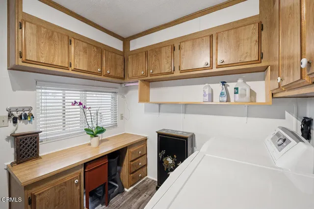 a house view with a backyard space