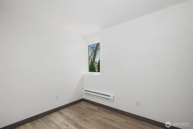 a view of small space with wooden floor