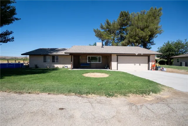 a kitchen with a stove and a refrigerator